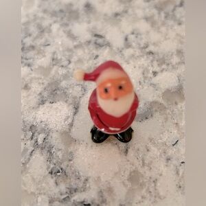 Vintage Kissing Santa Figurine